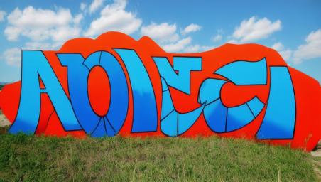 Blue and orange with a letter M,