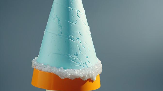 Crystal traffic cone with ice-cream in it.