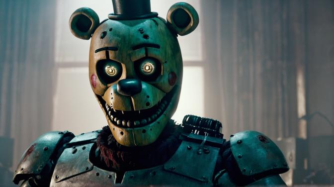 A horror movie at Five Nights at Freddy's with someone's face torn off in the background.