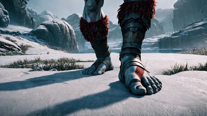 Kratos from God of War showing his toes.